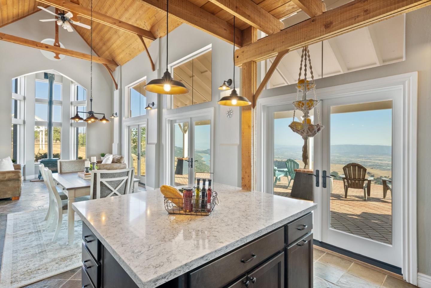 16650 Finley Ridge Road Morgan Hill, CA 95037 - Photo 17 of 85 a kitchen with a table chairs and wooden floor