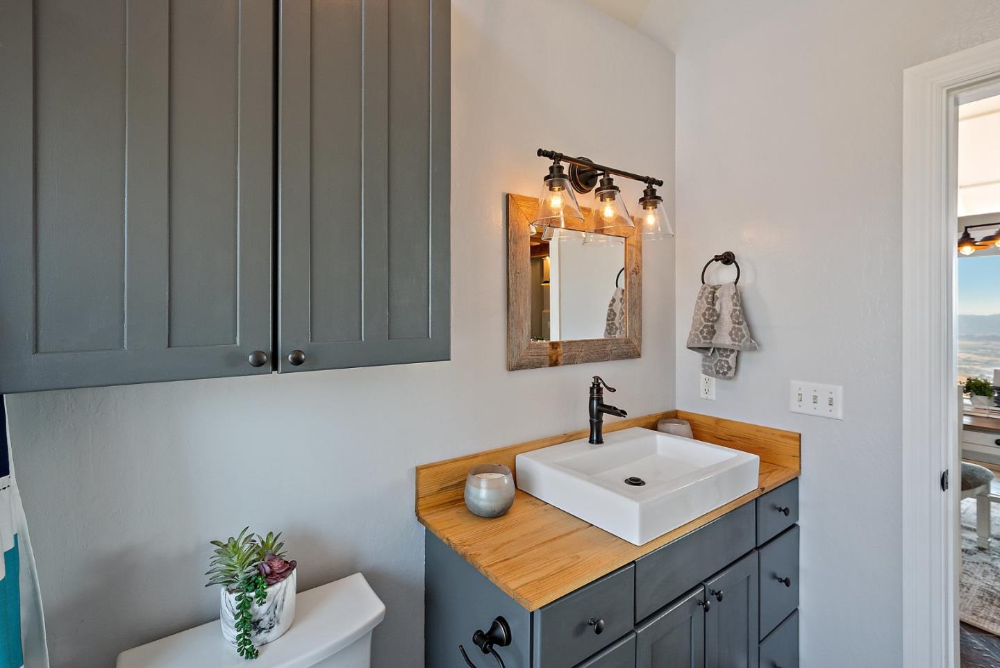 16650 Finley Ridge Road Morgan Hill, CA 95037 - Photo 20 of 85 a bathroom with a sink and a mirror