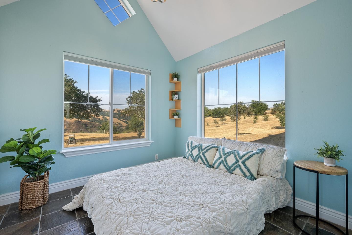 16650 Finley Ridge Road Morgan Hill, CA 95037 - Photo 23 of 85 a bed sitting in a bedroom next to a window
