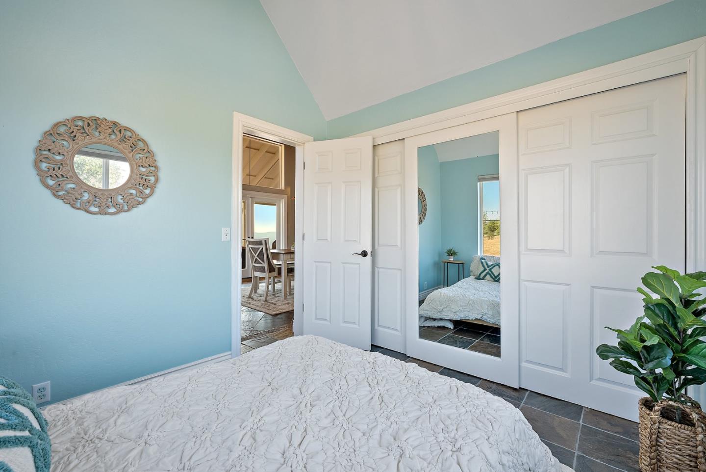 16650 Finley Ridge Road Morgan Hill, CA 95037 - Photo 24 of 85 a bedroom with a bed and a potted plant