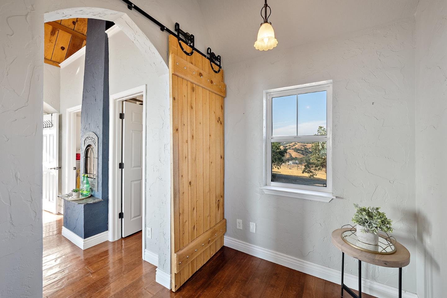 16650 Finley Ridge Road Morgan Hill, CA 95037 - Photo 37 of 85 a view of hallway with furniture and wooden floor