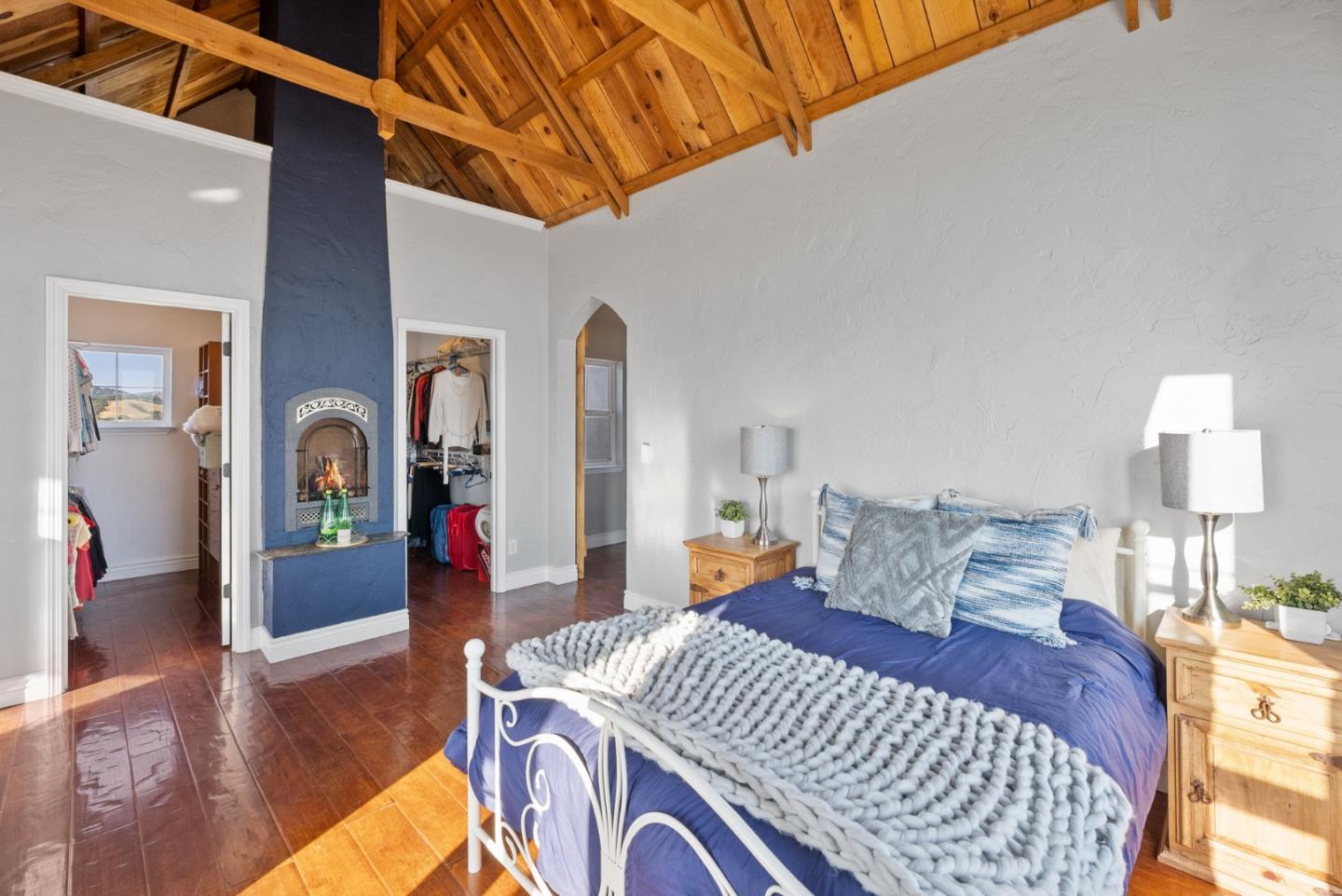 16650 Finley Ridge Road Morgan Hill, CA 95037 - Photo 38 of 85 a bedroom with a bed and a mirror