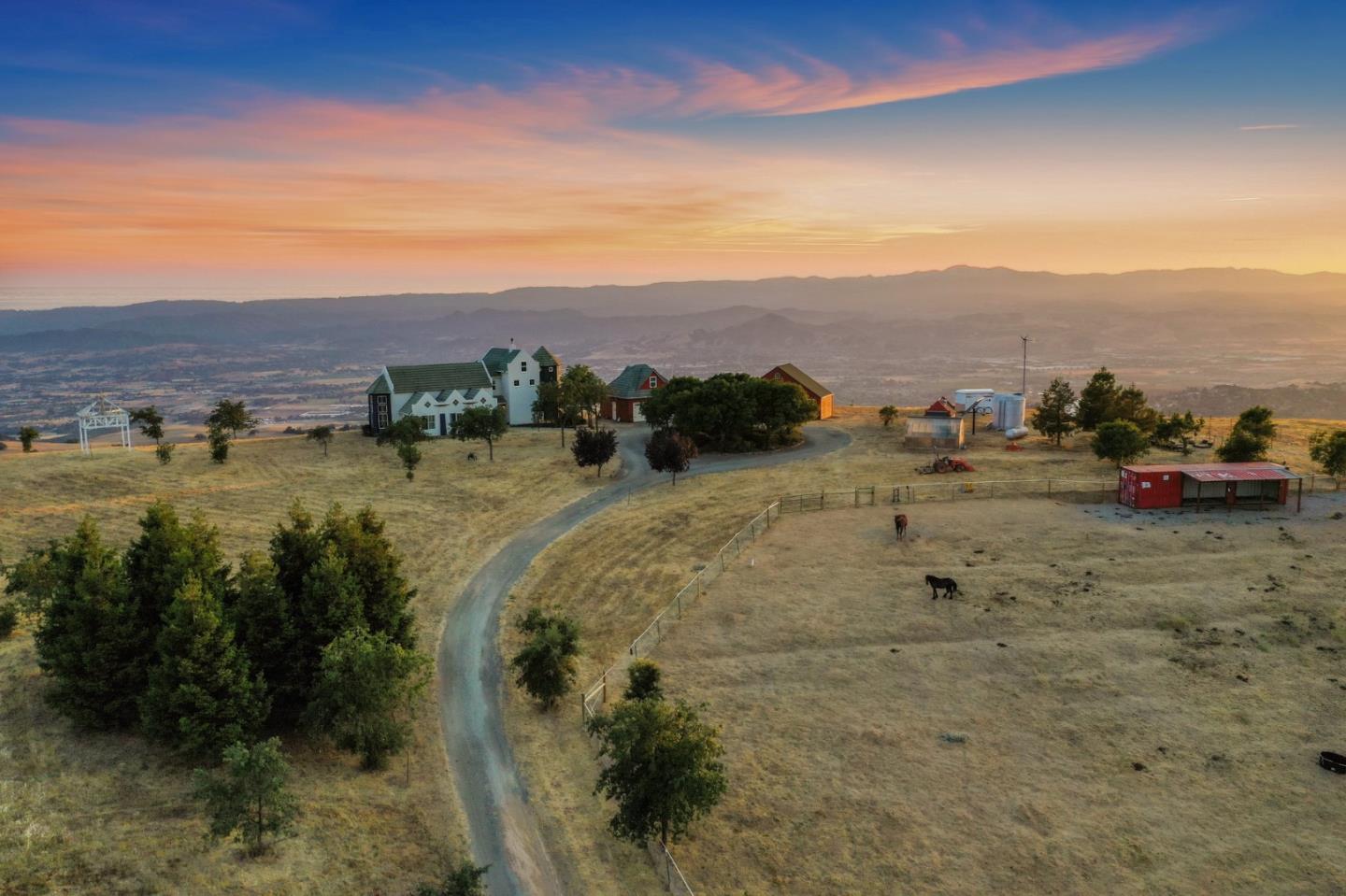 16650 Finley Ridge Road Morgan Hill, CA 95037 - Photo 80 of 85 a view of a lake with houses in the back