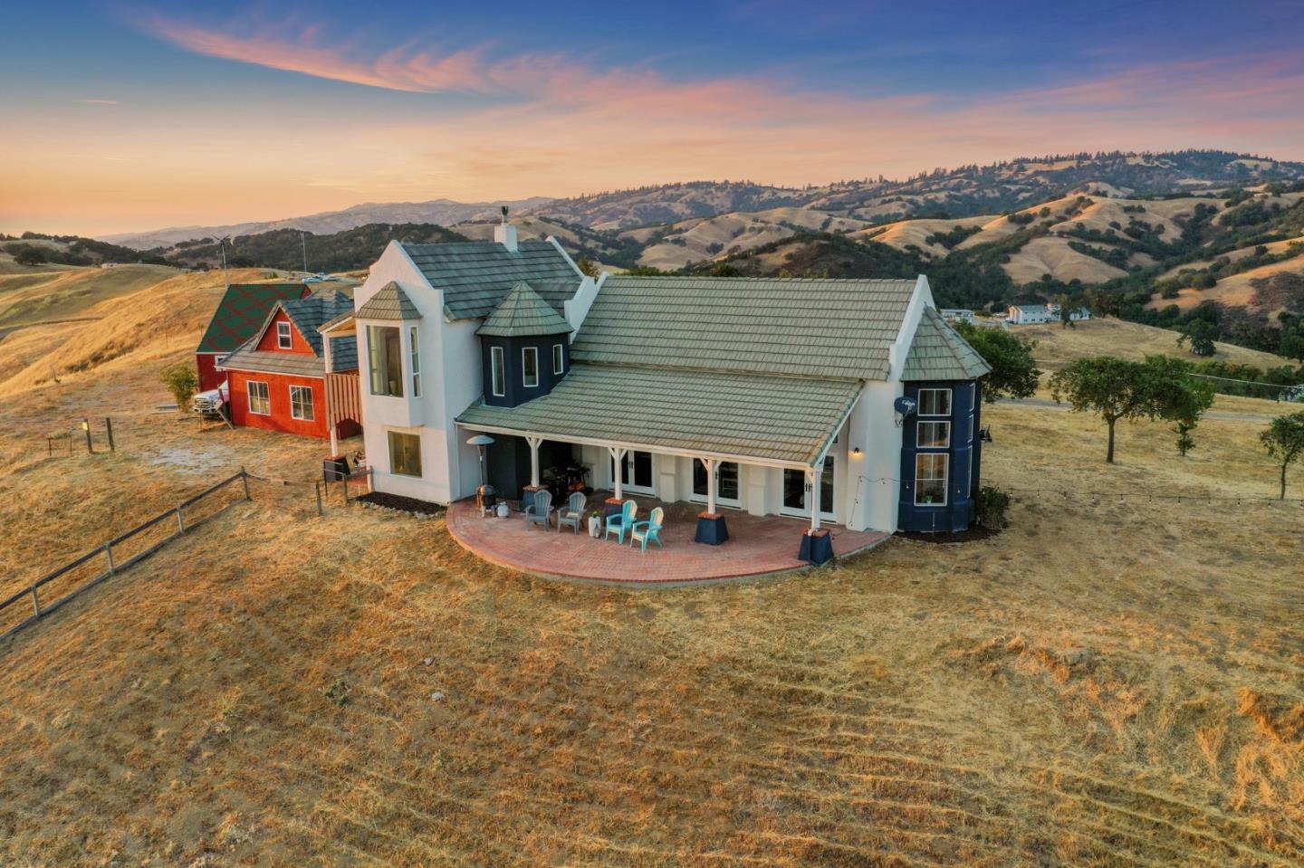 16650 Finley Ridge Road Morgan Hill, CA 95037 - Photo 84 of 85 an aerial view of a house with a garden and lake view