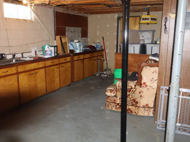 a bathroom with a sink and mirror