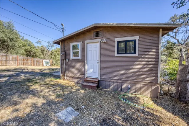 a view of backyard with green space