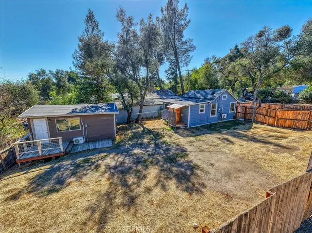 a view of backyard of house