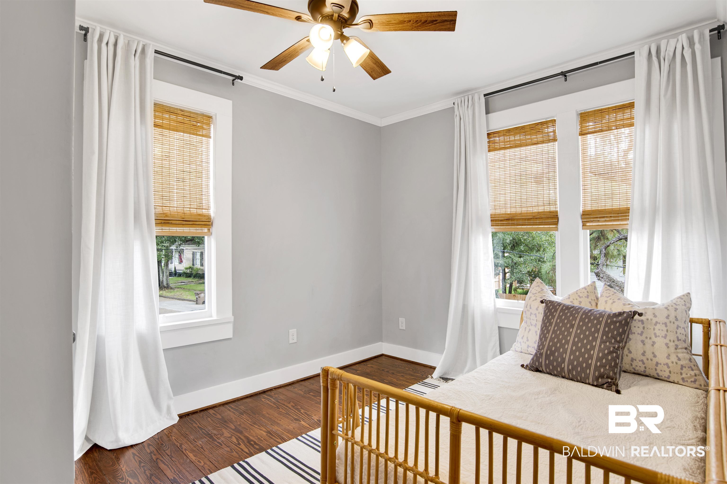 123 Macy Place Mobile, AL 36604 - Photo 17 of 35 Bedroom featuring wood finished floors, ornamental molding, and ceiling fan