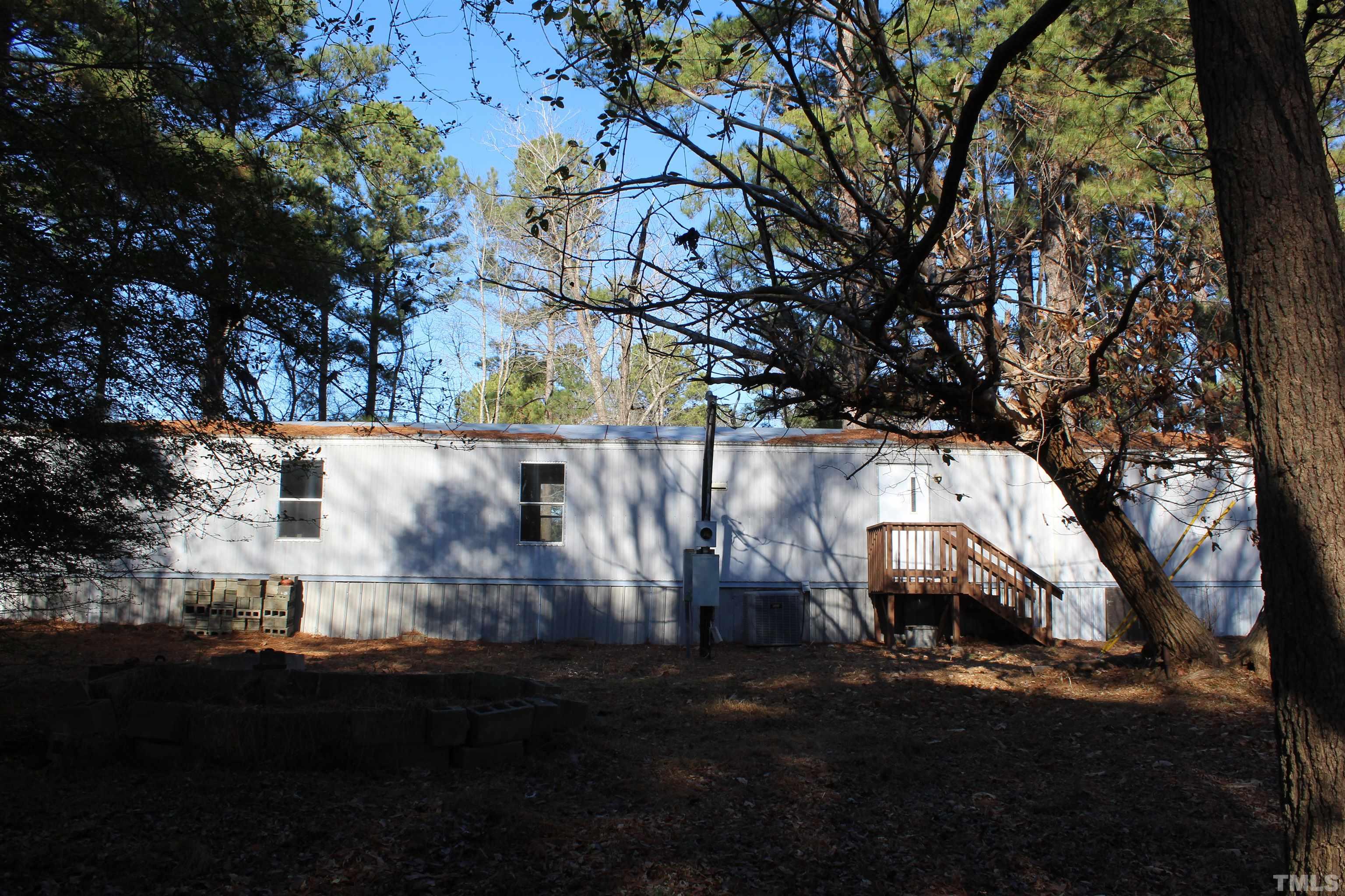 3617 Banks Road Raleigh, NC 27603 - Photo 11 of 37 a view of outdoor space with garden and trees