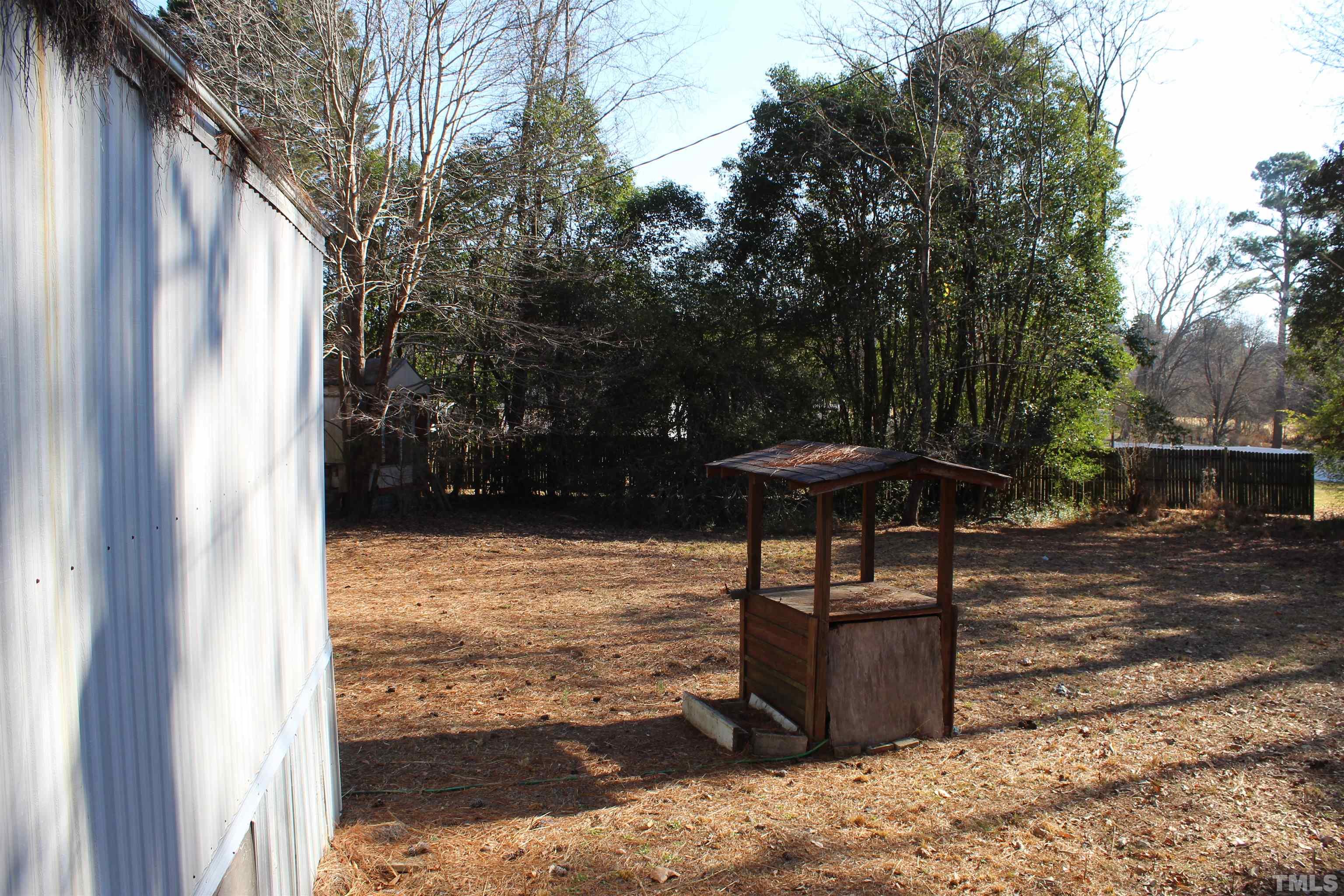 3617 Banks Road Raleigh, NC 27603 - Photo 26 of 37 a front view of a house with a yard