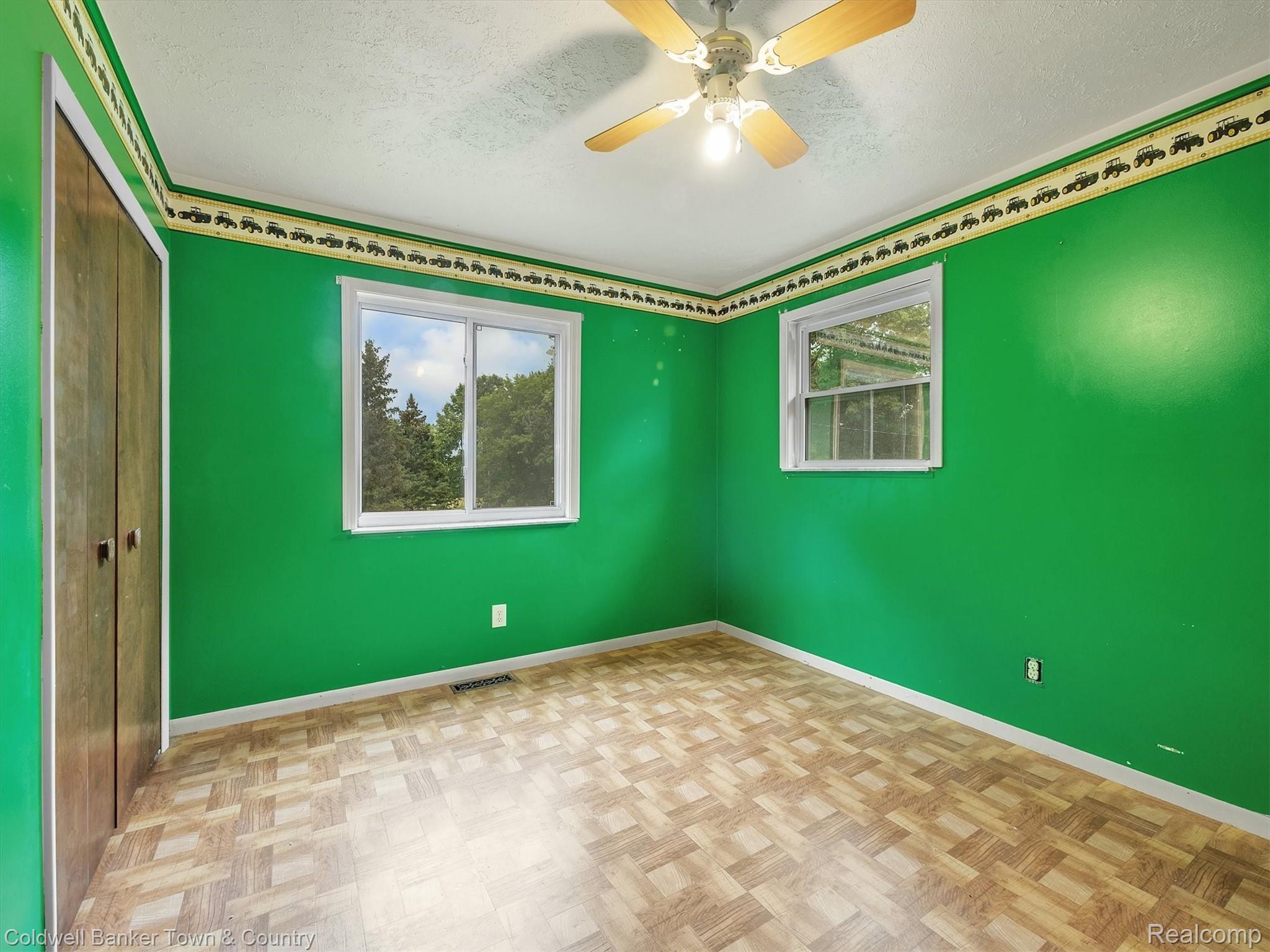 5432 Evans Road Holly, MI 48442 - Photo 20 of 39 Fun and spacious bedroom with tractor border
