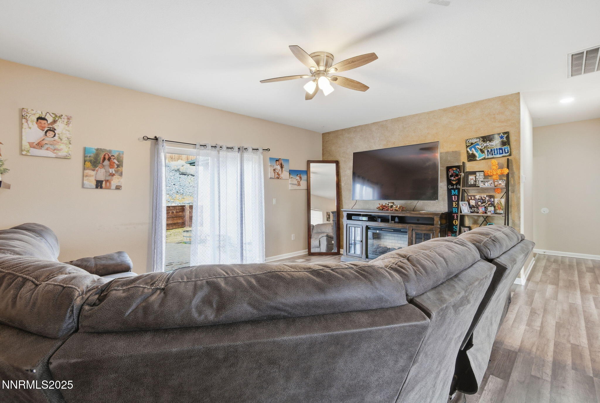 365 Orrcrest Drive Reno, NV 89506 - Photo 11 of 21 a living room with a couch and a flat screen tv