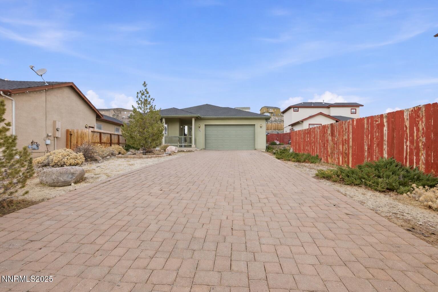 365 Orrcrest Drive Reno, NV 89506 - Photo 2 of 21 a view of a house with a yard and pathway