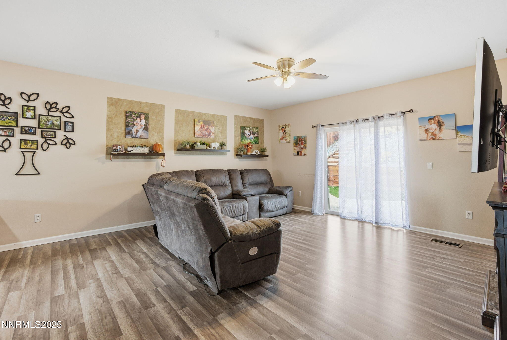 365 Orrcrest Drive Reno, NV 89506 - Photo 4 of 21 a living room with furniture and a flat screen tv