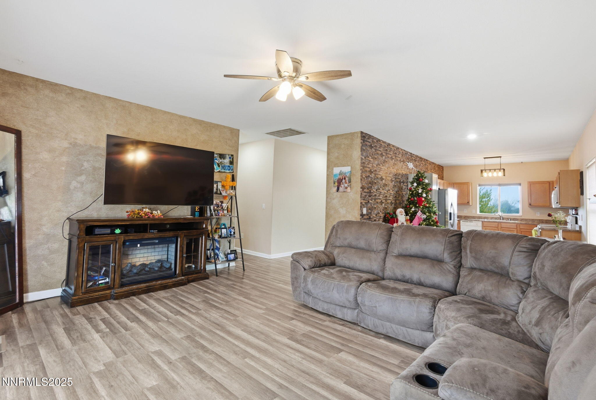 365 Orrcrest Drive Reno, NV 89506 - Photo 5 of 21 a living room with furniture and a flat screen tv