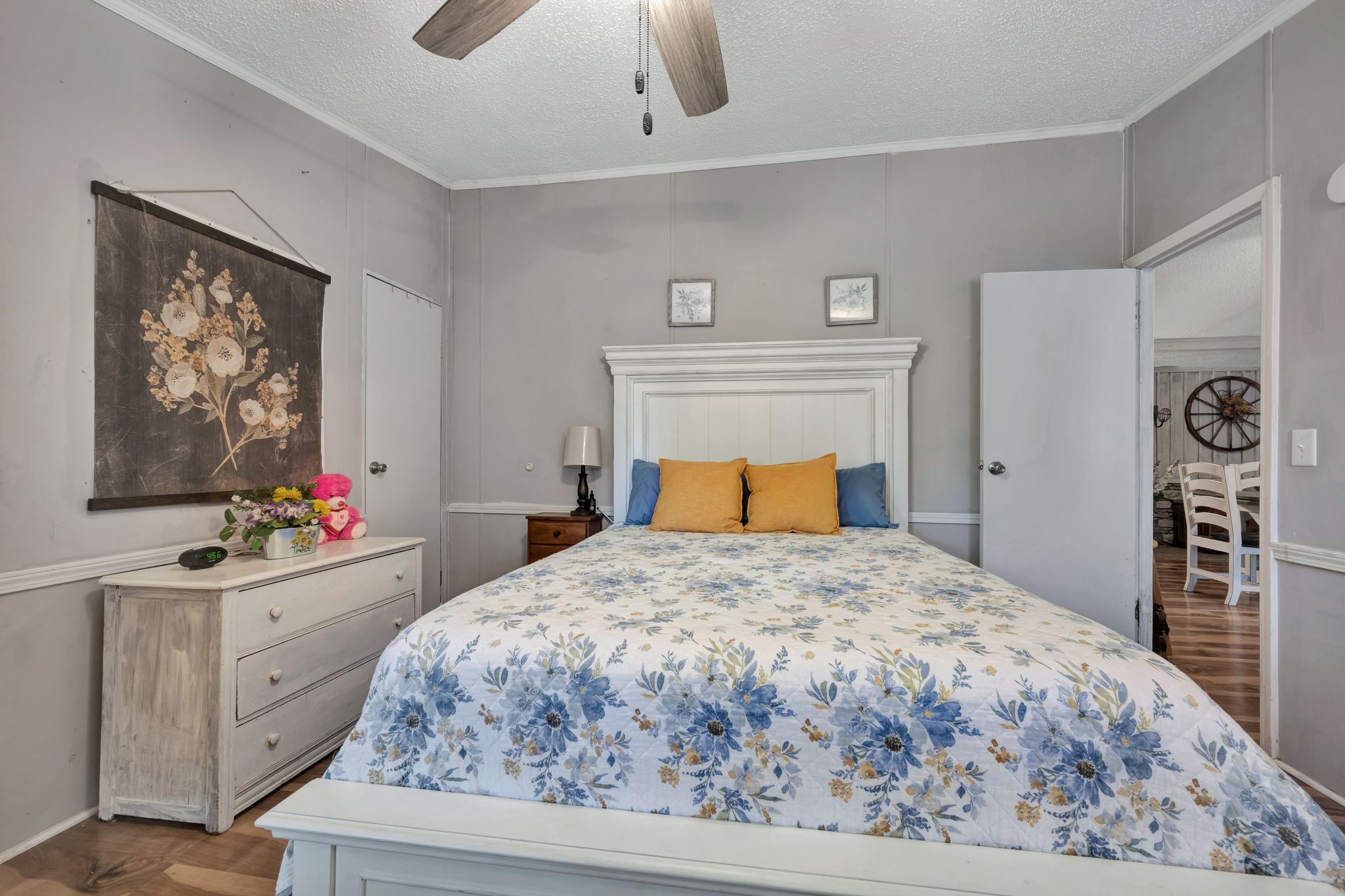 944 Deason Road Dickson, TN 37055 - Photo 18 of 28 a bedroom with a bed and a flat screen tv