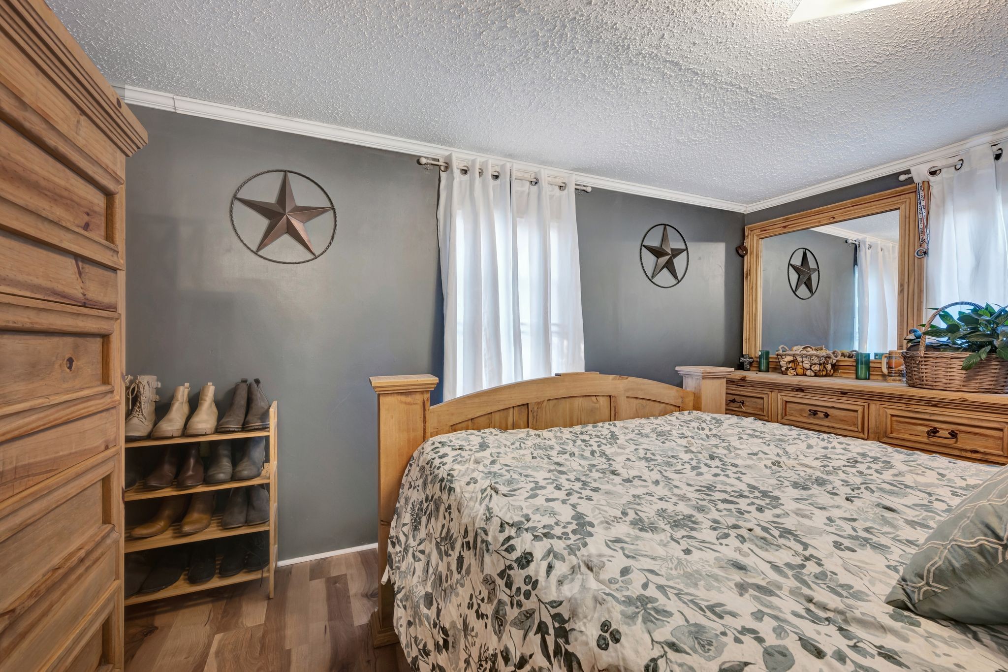 944 Deason Road Dickson, TN 37055 - Photo 20 of 28 a bedroom with a bed and a cabinets