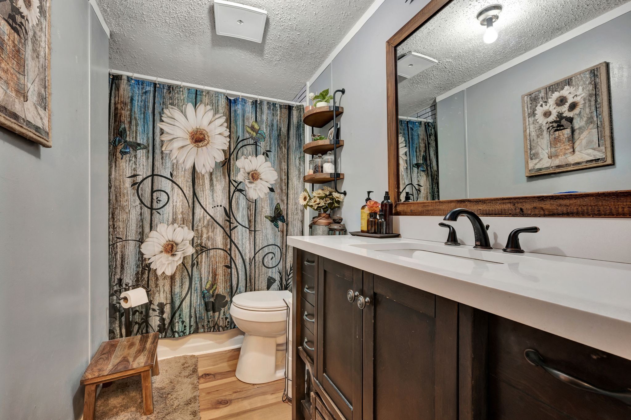 944 Deason Road Dickson, TN 37055 - Photo 24 of 28 a bathroom with a sink a toilet and shower