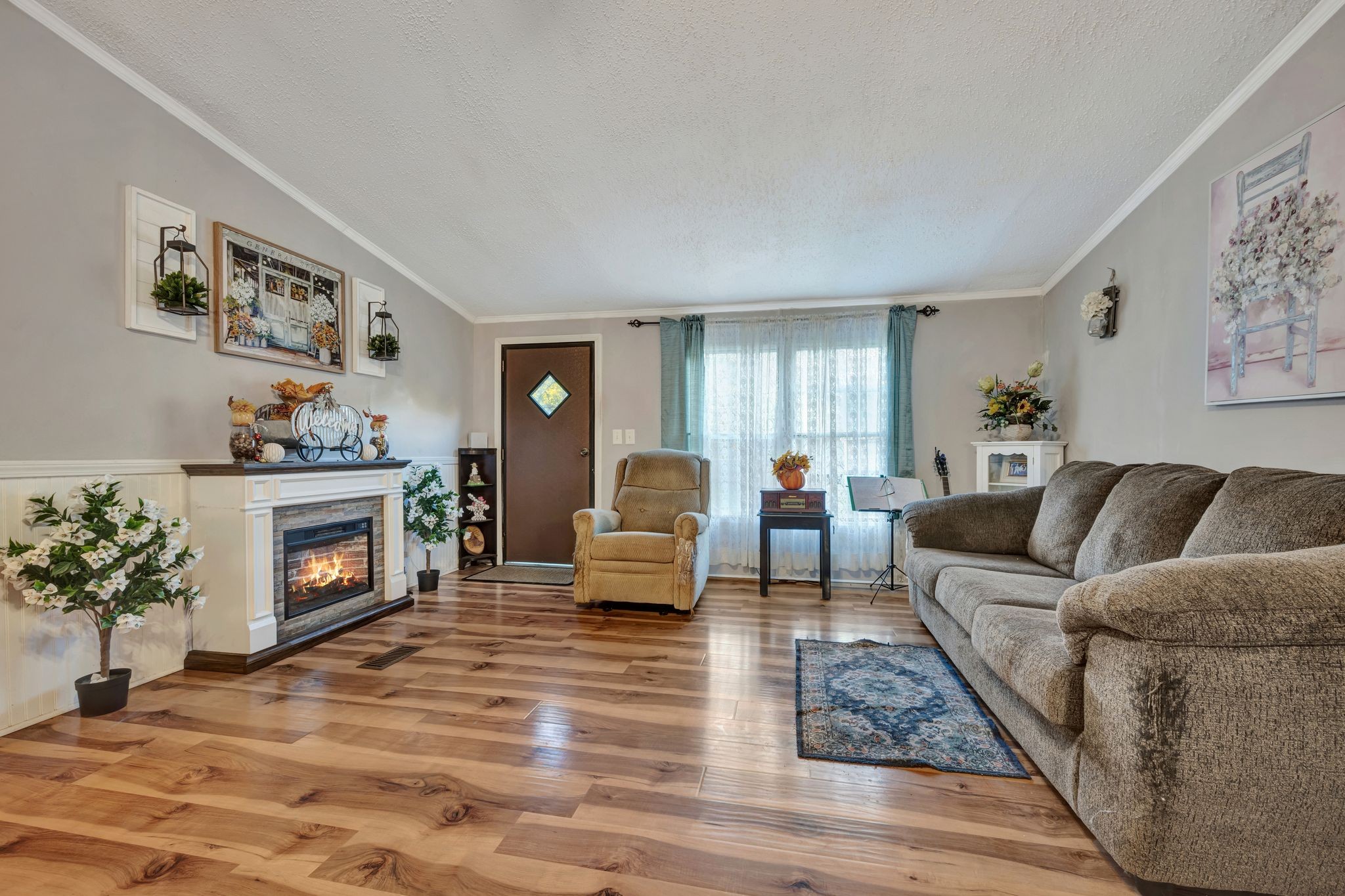 944 Deason Road Dickson, TN 37055 - Photo 5 of 28 a living room with furniture and a fireplace