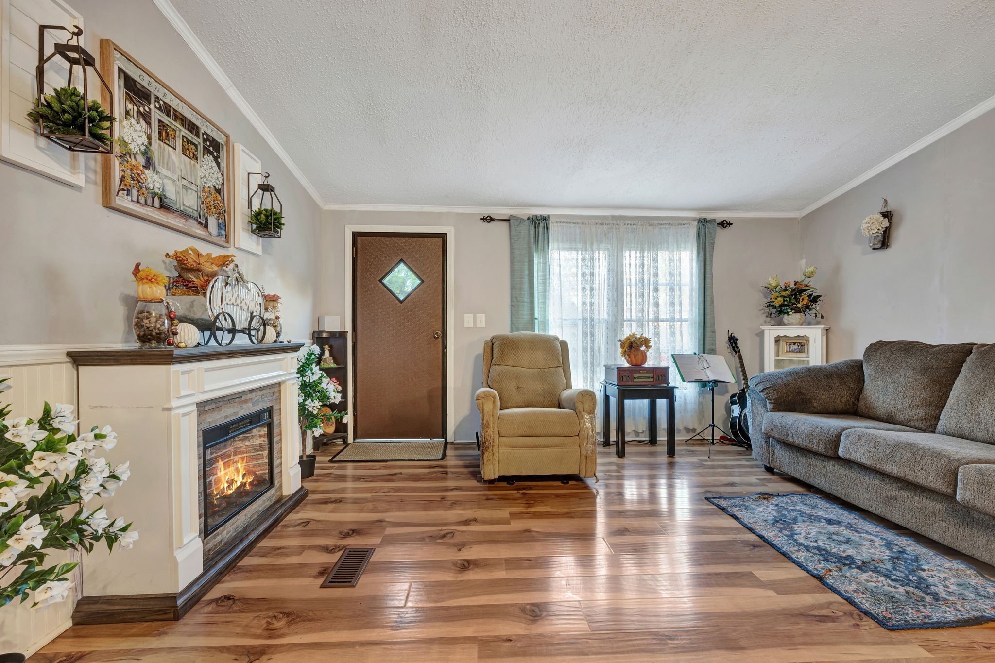 944 Deason Road Dickson, TN 37055 - Photo 6 of 28 a living room with furniture and a fireplace