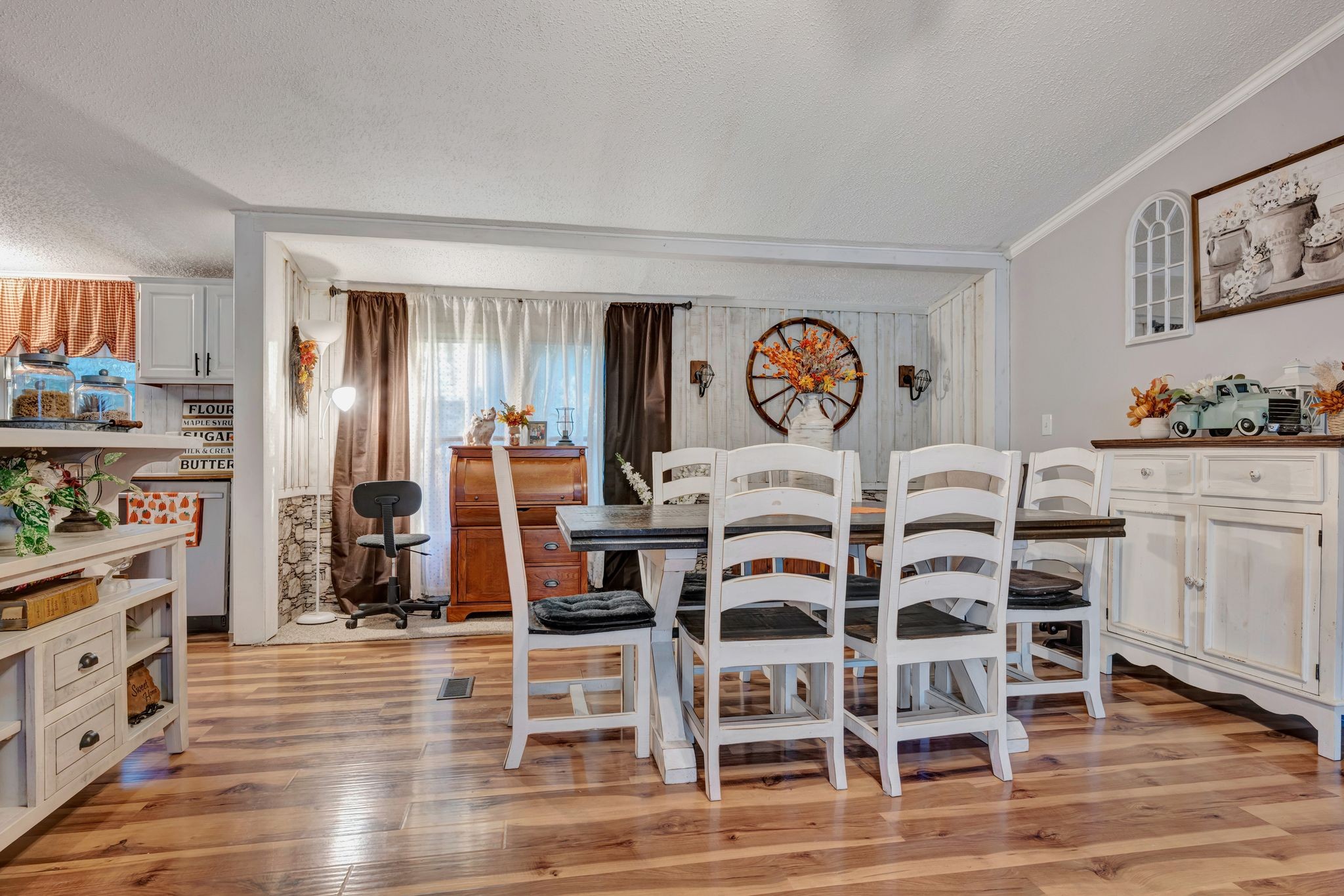 944 Deason Road Dickson, TN 37055 - Photo 8 of 28 a dining room with furniture and wooden floor