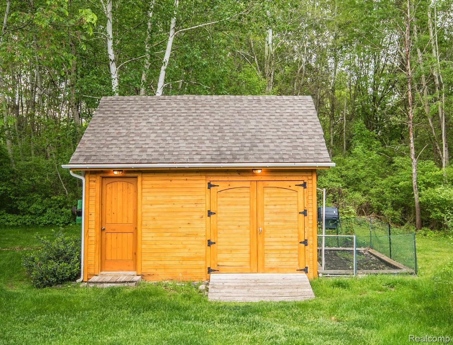 5542 Clarkston Road Clarkston, MI 48348 - Photo 80 of 85 OVER-SIZED SHED WIRED AND READY FOR ELECTRICITY