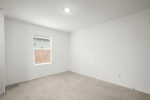 a view of a kitchen with a sink and a stove top oven