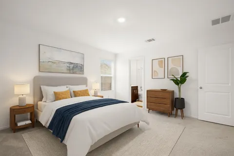 a kitchen with granite countertop a sink stove and refrigerator