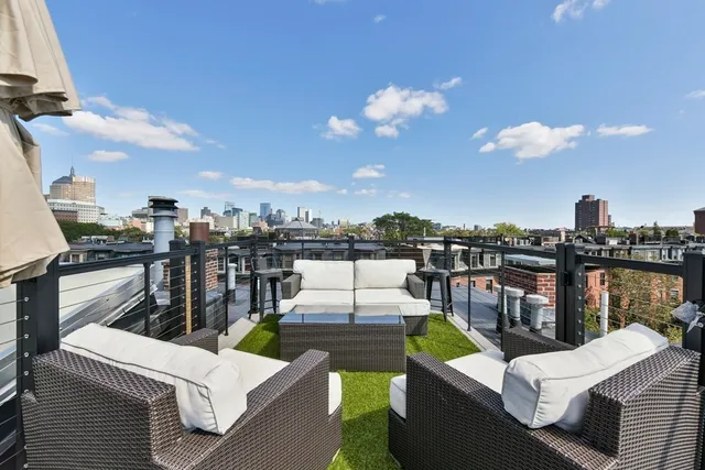 a view of a terrace with couches