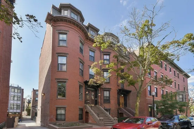 a front view of a multi story residential apartment building