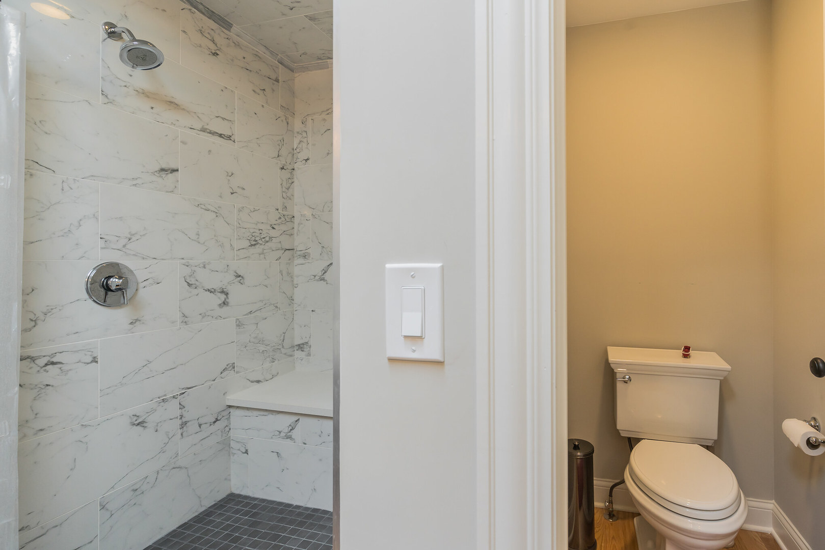 201 Spring Street Cary, IL 60013 - Photo 22 of 34 a bathroom with a toilet and a shower