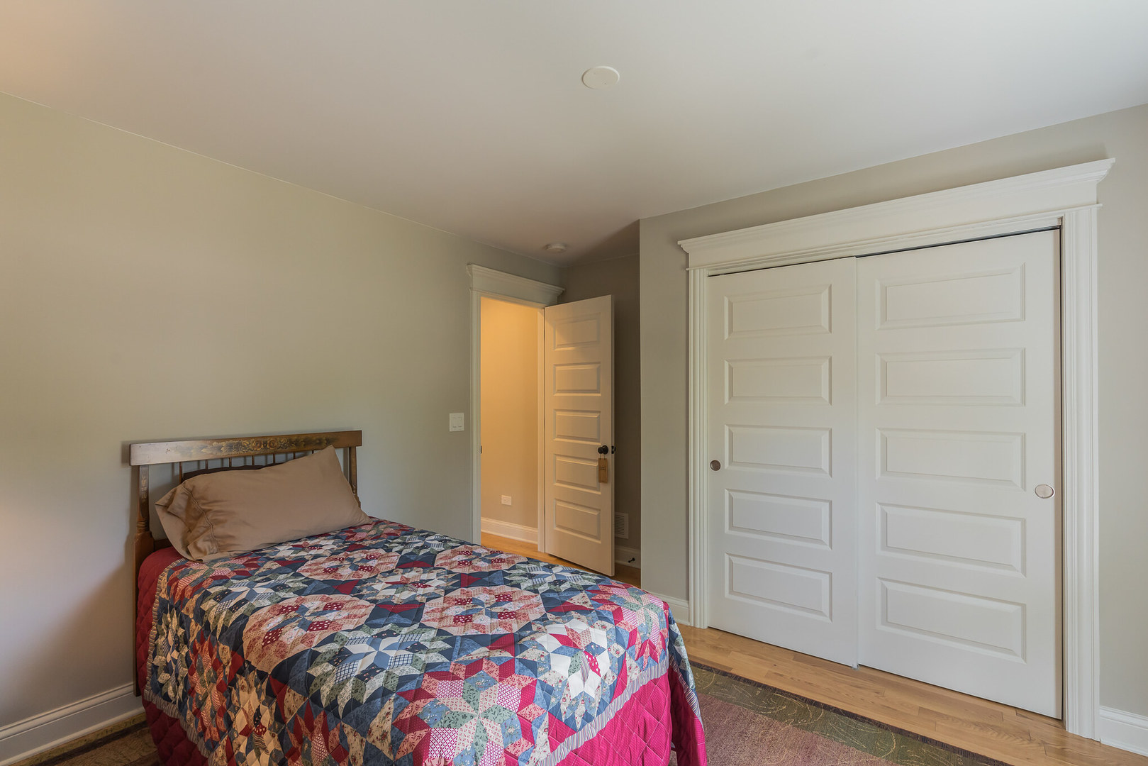 201 Spring Street Cary, IL 60013 - Photo 24 of 34 a bedroom with a bed and a closet