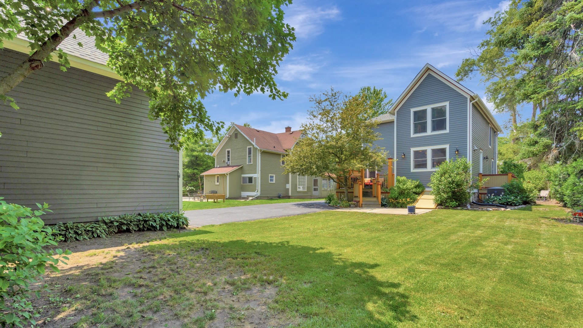 201 Spring Street Cary, IL 60013 - Photo 31 of 34 a front view of a house with a yard and trees