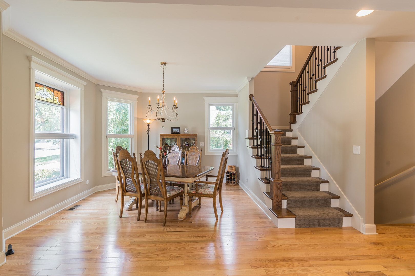 201 Spring Street Cary, IL 60013 - Photo 7 of 34 a view of a dining room with furniture and wooden floor