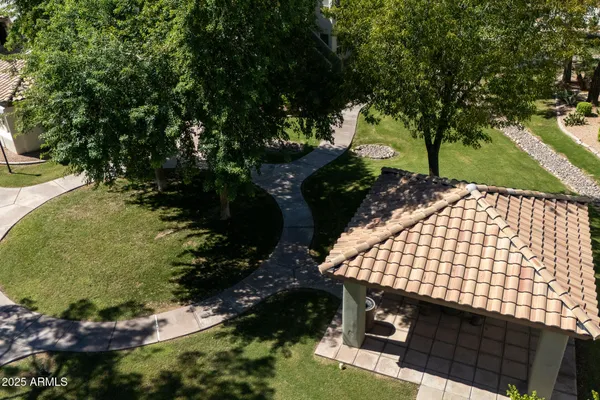 an aerial view of a house with a lake view