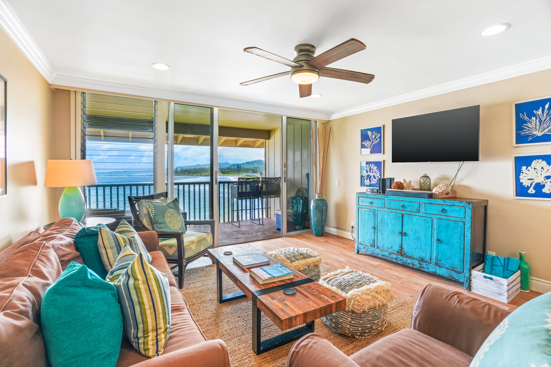 320 Papaloa Road, Unit 308 Kapaa, HI 96746 - Photo 4 of 26 a living room with furniture and a flat screen tv
