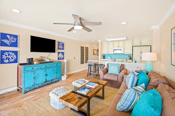a living room with furniture and a flat screen tv