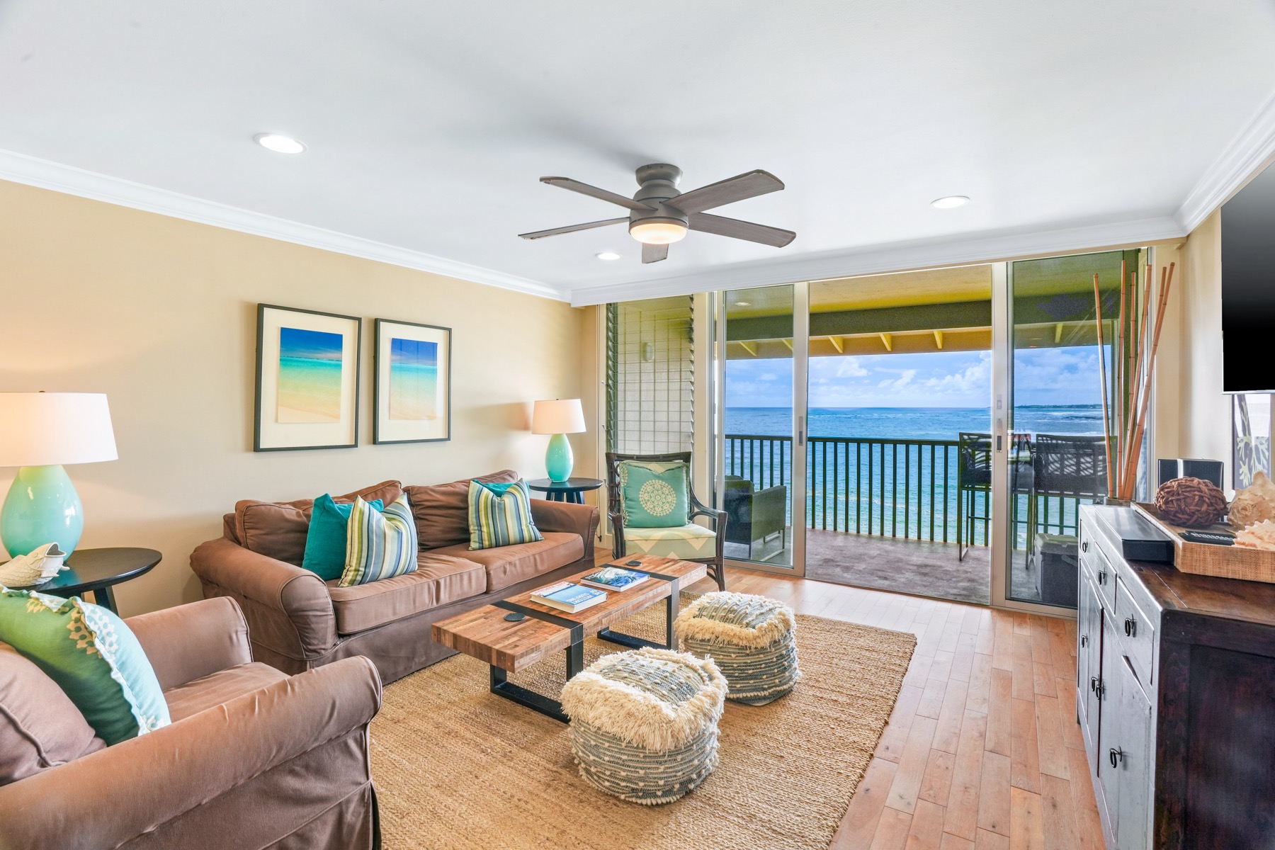 320 Papaloa Road, Unit 308 Kapaa, HI 96746 - Photo 6 of 26 a living room with furniture and a large window with outer view