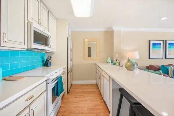 a kitchen with a sink and cabinets