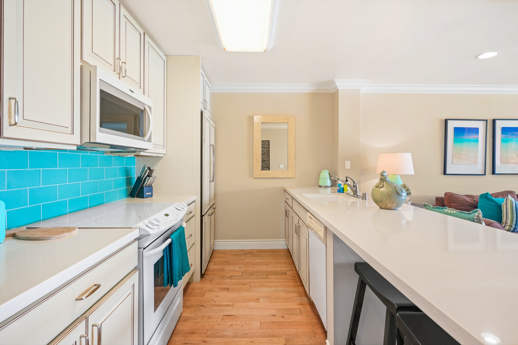 320 Papaloa Road, Unit 308 Kapaa, HI 96746 - Photo 9 of 26 a kitchen with a sink and cabinets