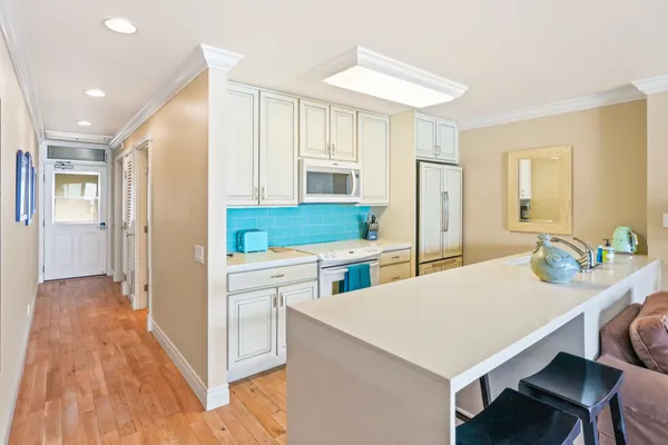 a kitchen that has a cabinets and a stove