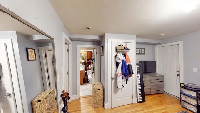 a view of a livingroom with a furniture and a flat screen tv