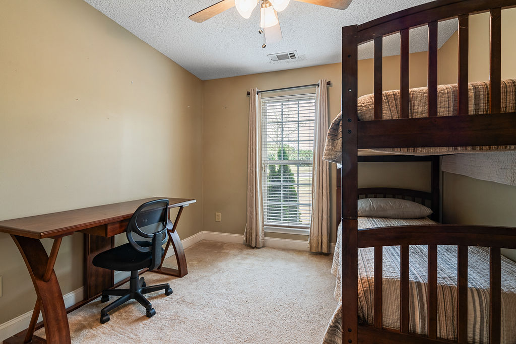 43 Graham Way Hartwell, GA 30643 - Photo 7 of 20 This cozy bedroom offers a functional layout with ample natural light.
