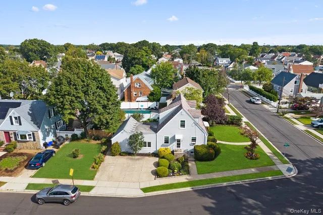 an aerial view of a house with a garden