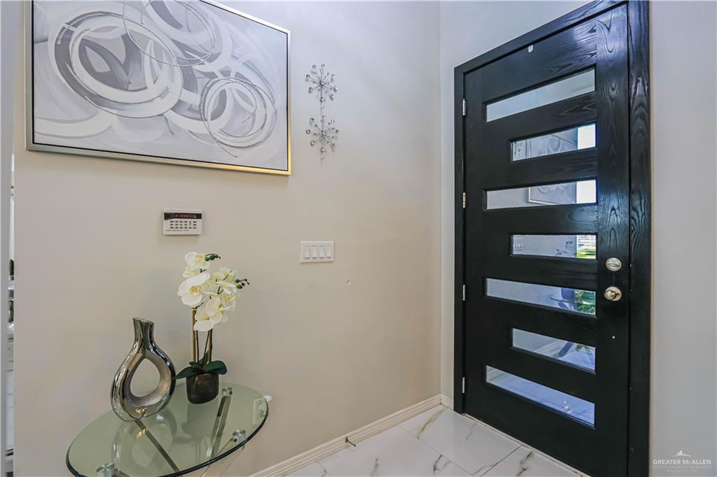 823 Whitewing Street Alamo, TX 78516 - Photo 2 of 15 a table with a rug