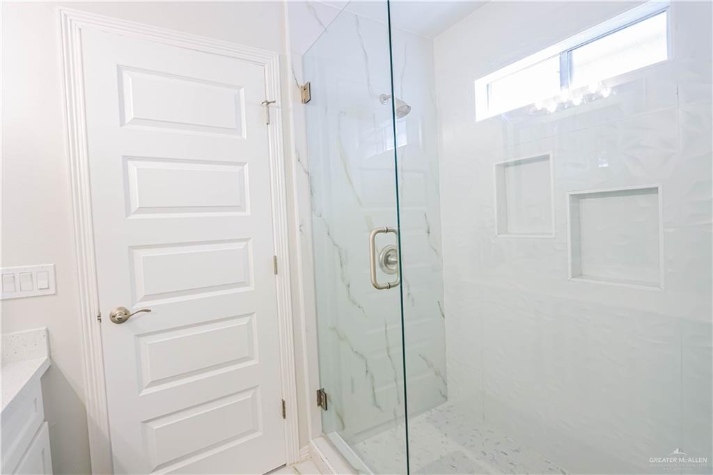 823 Whitewing Street Alamo, TX 78516 - Photo 10 of 15 a bathroom with a shower