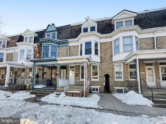 a picture of a bench in front of a door