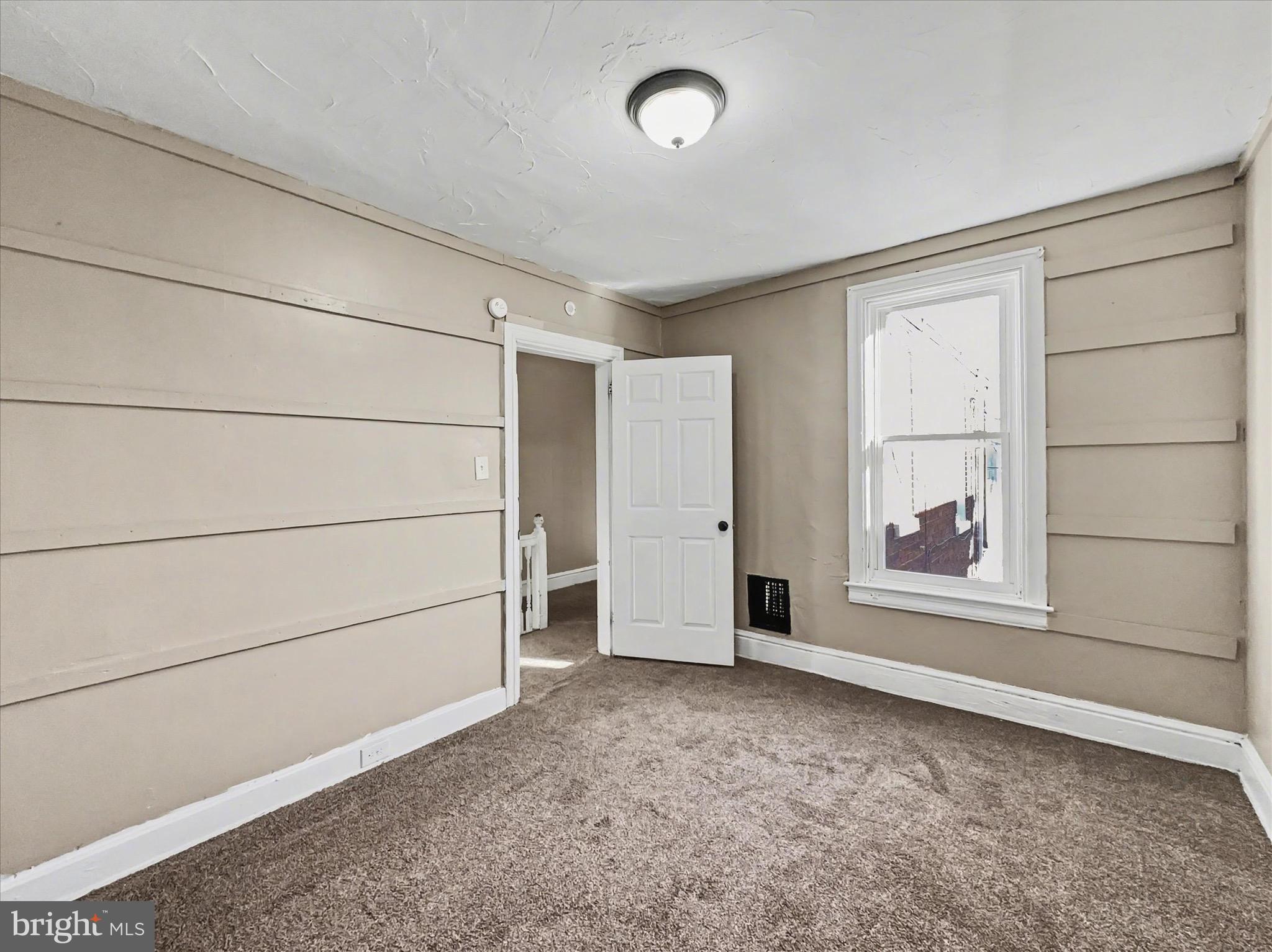 830 East Philadelphia Street York, PA 17403 - Photo 14 of 27 an empty room with a empty space and window