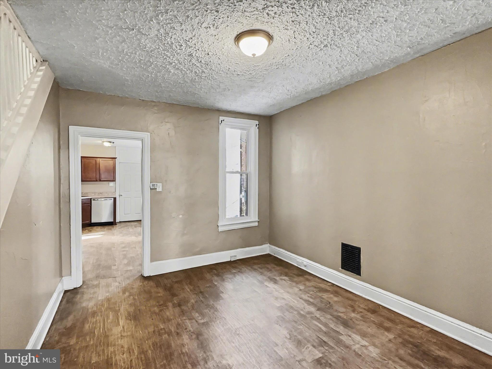 830 East Philadelphia Street York, PA 17403 - Photo 6 of 27 an empty room with a empty space and windows