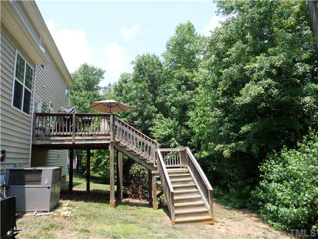 4441 Fairview Ridge Lane Apex, NC 27539 - Photo 24 of 25 Enjoy this home inside and out- lots of backyard on this large lot Exterior Back